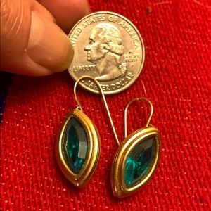 Green and gold colored earrings